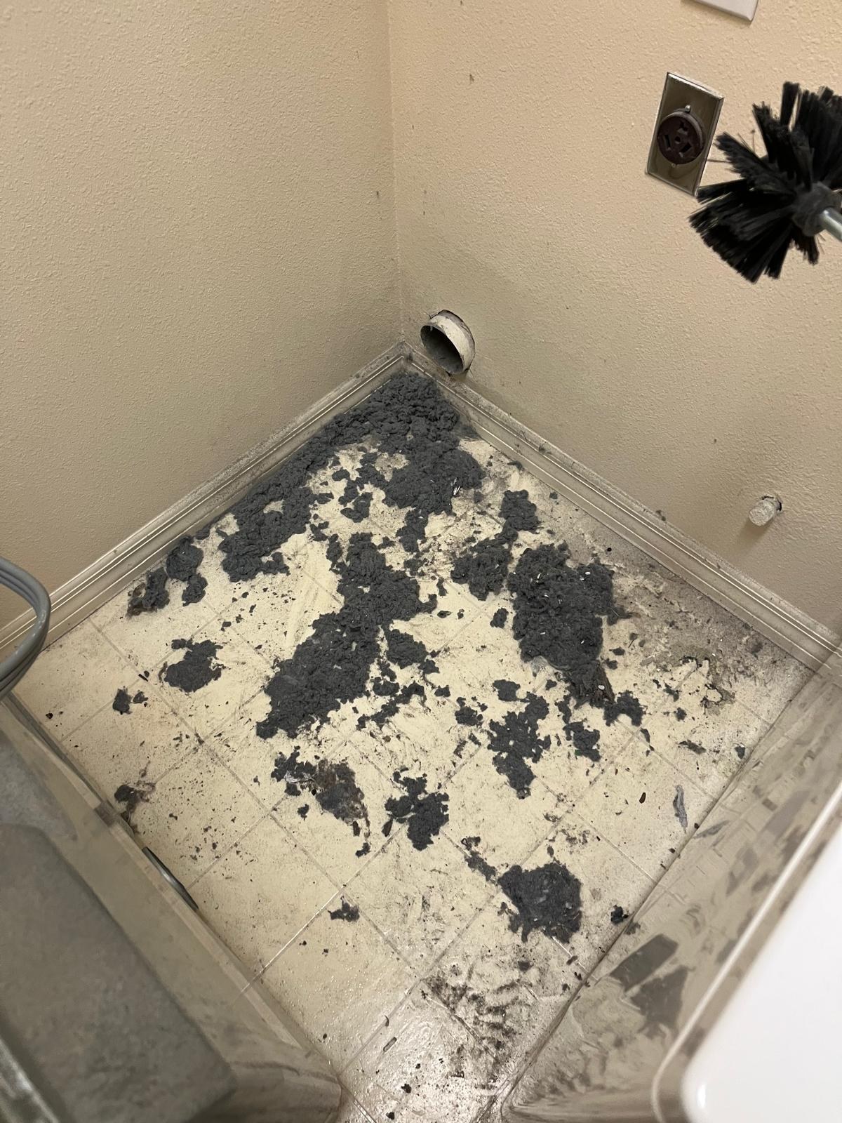 Pile of lint removed from a clogged dryer vent during cleaning in Port St. Lucie FL