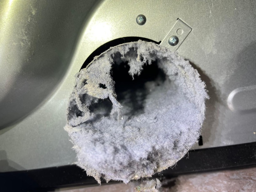 Dryer vent blocked with lint before SunDuct cleaning